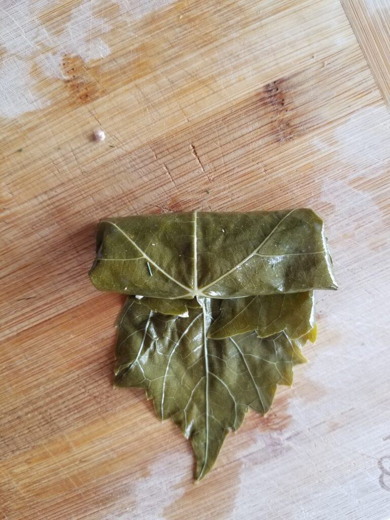 how to roll the stuffed grape leaves