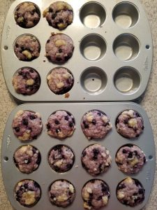 mini wild blueberry crumble muffins after baking