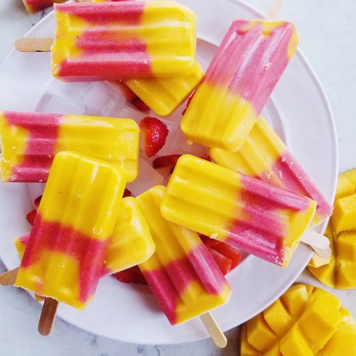 Healthy Strawberry Mango Popsicles - The Clean Eating Couple