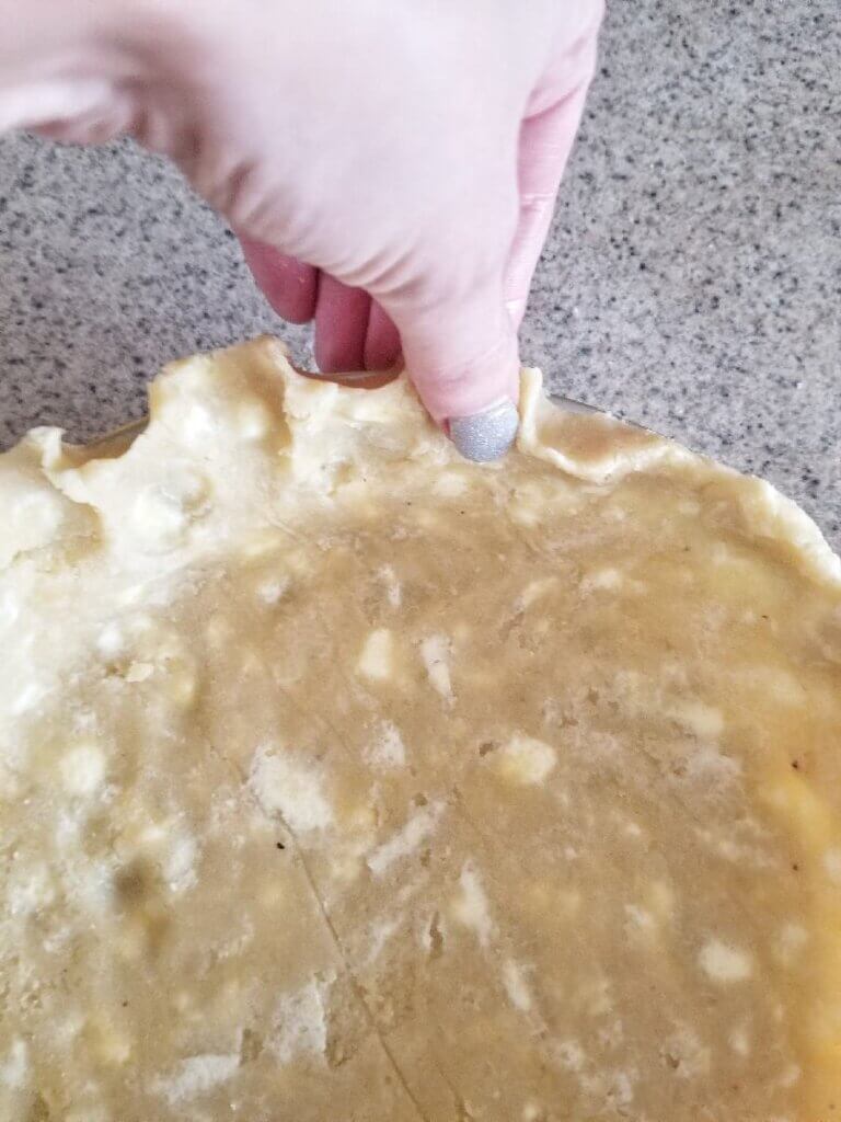 forming the edges of the almond flour pie crust