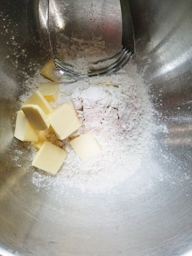 cutting butter into the gluten free flour 