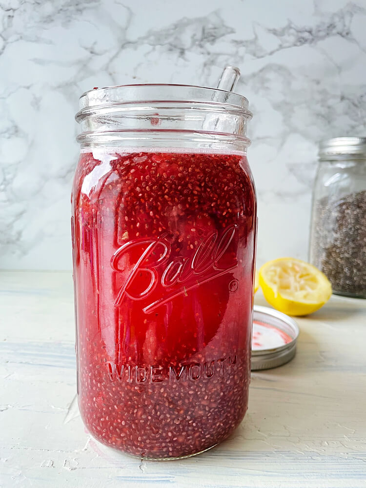 Raspberry Lemon Chia Water in a mason jar