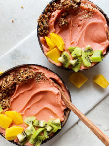 Strawberry mango smoothie bowls with toppings
