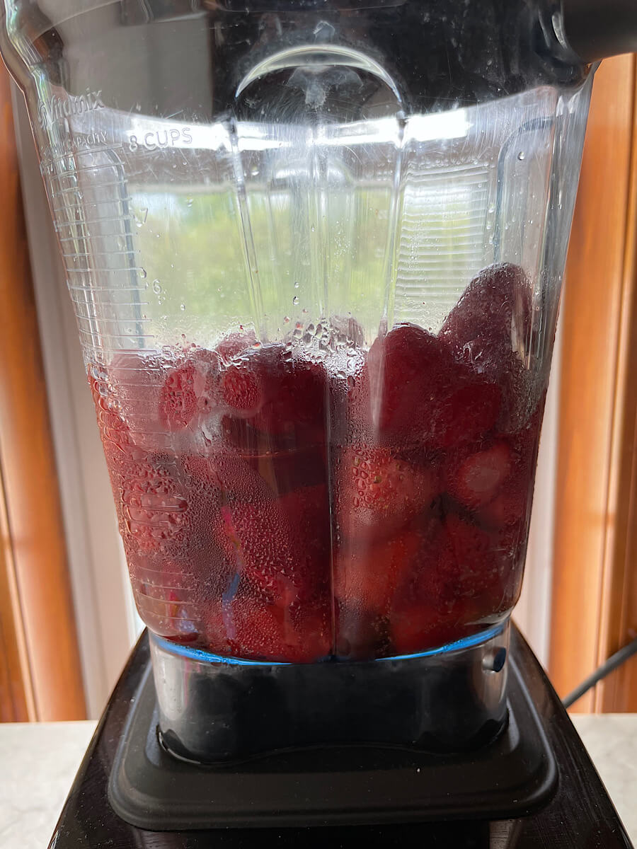 strawberries and champagne in a blender