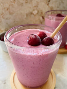 easy cranberry smoothie topped with cranberries