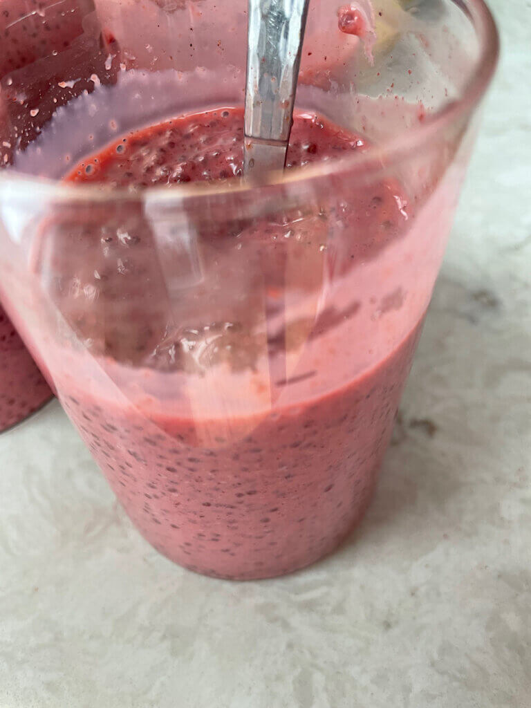 pink chia pudding in a light fluffy texture
