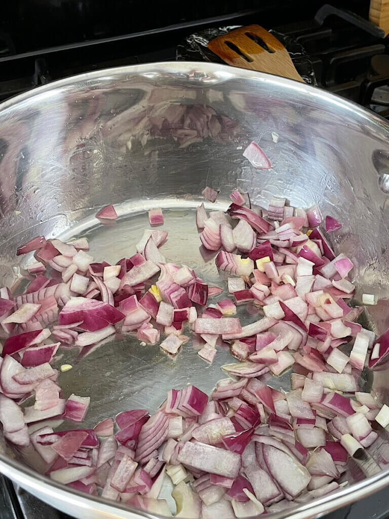 sauté red onion in a large pot