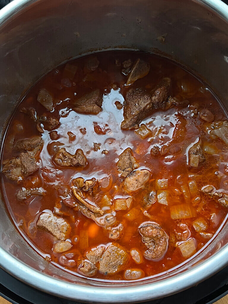 fasolia lamb and white bean stew cooked in pressure cooker